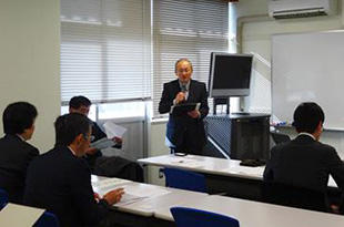Dr. Fumiaki Suzuki giving an opening speech