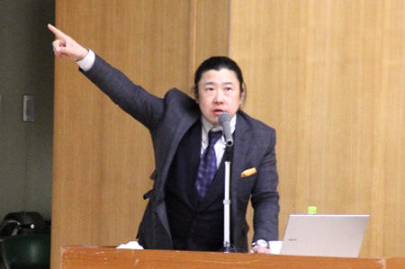 Mr. Atsumi giving a speech