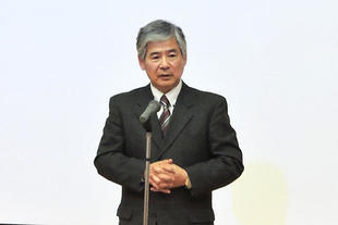 Mr. Yoshida giving a speech
