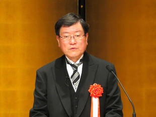 President Moriwaki giving a speech