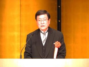 President Hisataka Moriwaki giving a speech